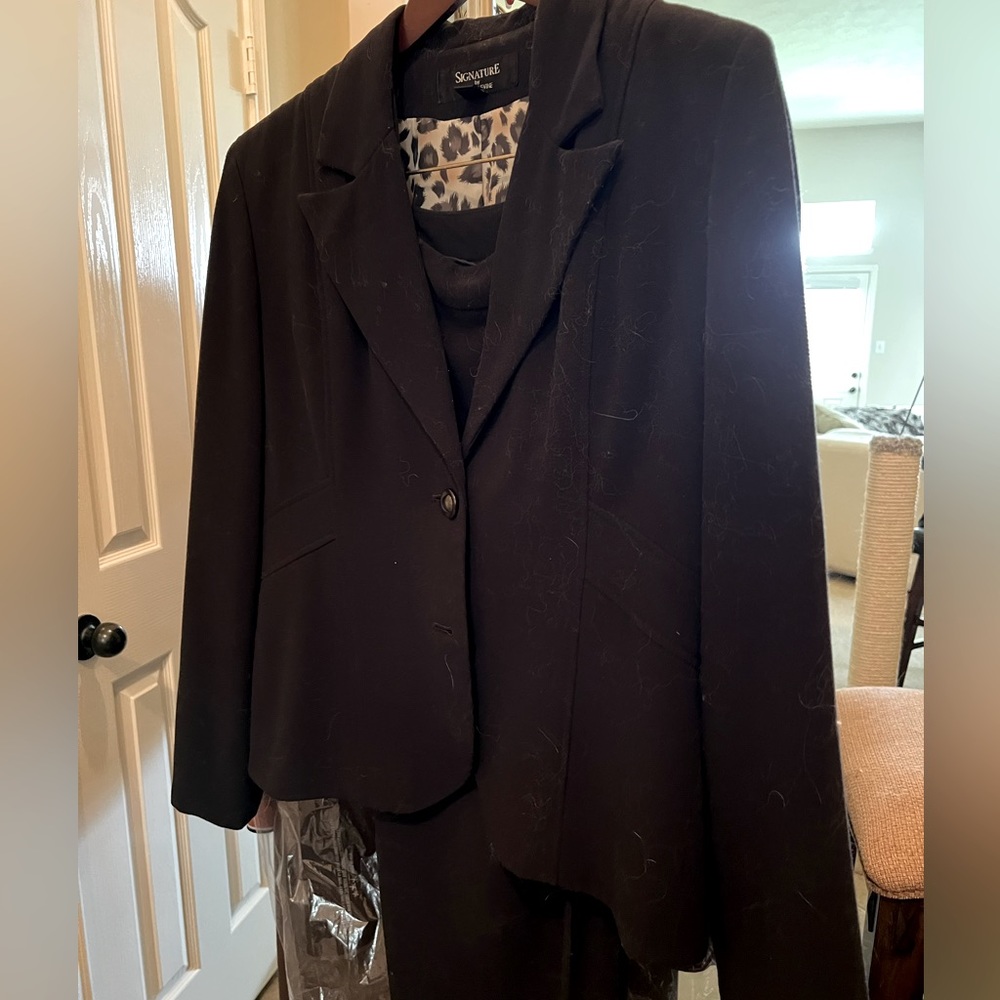 Larry Levine, black pantsuit